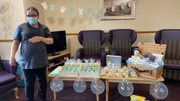 Scone care home throw surprise baby shower for Care Assistant